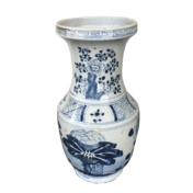 blue and white vase with flowers